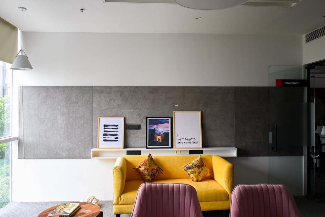 Modern office reception area with plants and seating