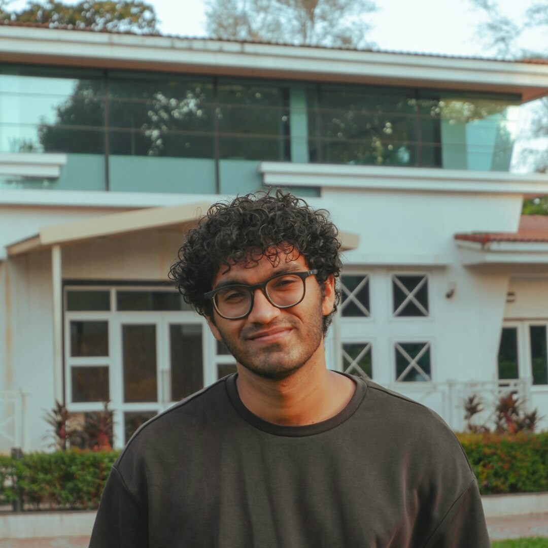 Portrait of a Brazilian man with glasses smiling