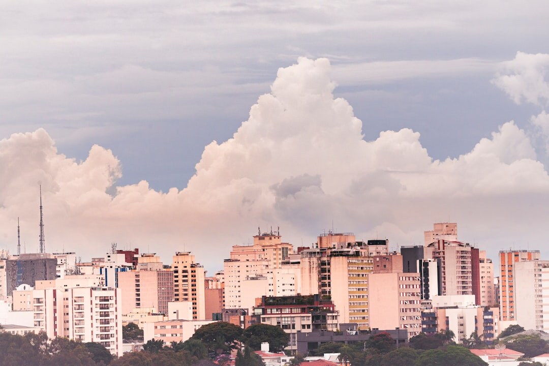 Sao Paulo city skyline at dusk with illuminated buildings