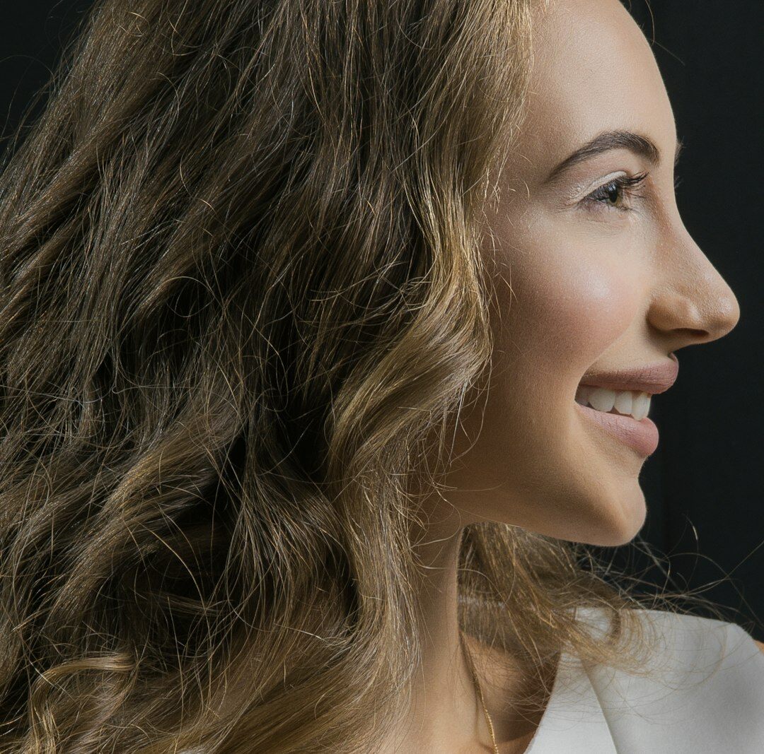 Portrait of a smiling Brazilian woman with long hair