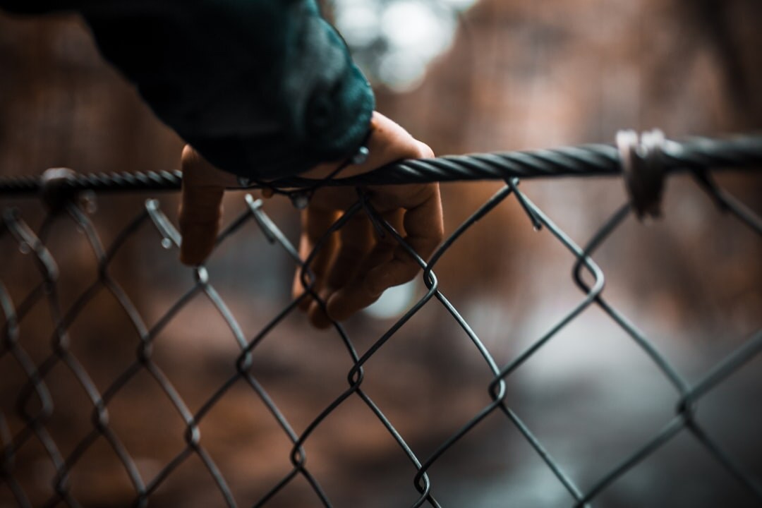 person breaking chains
