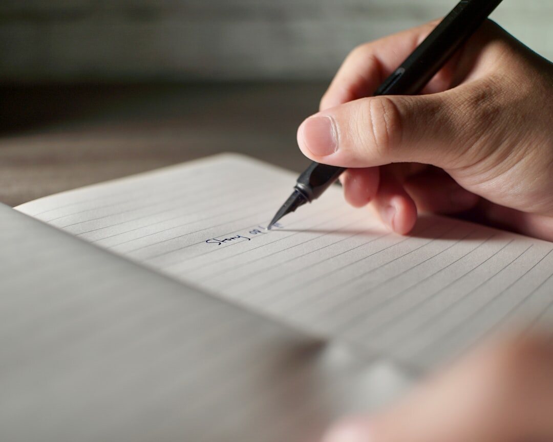person writing notes