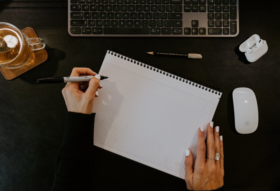 journal writing at desk